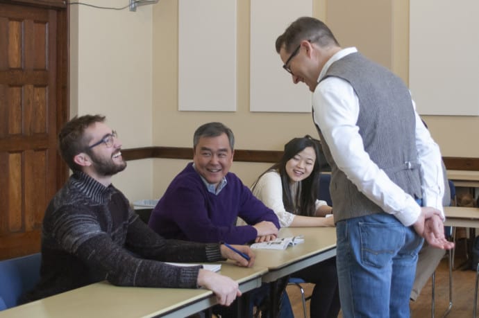 students and teacher in classroom