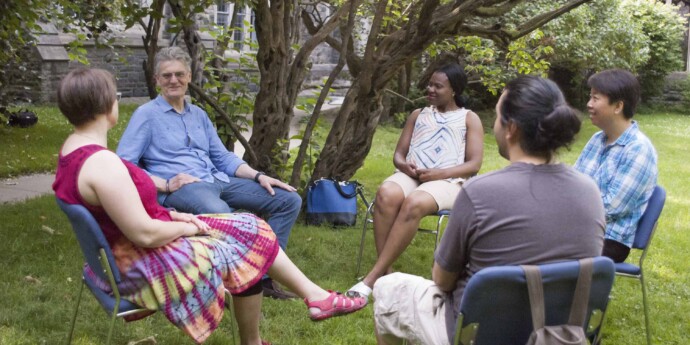 students meeting in courtyard